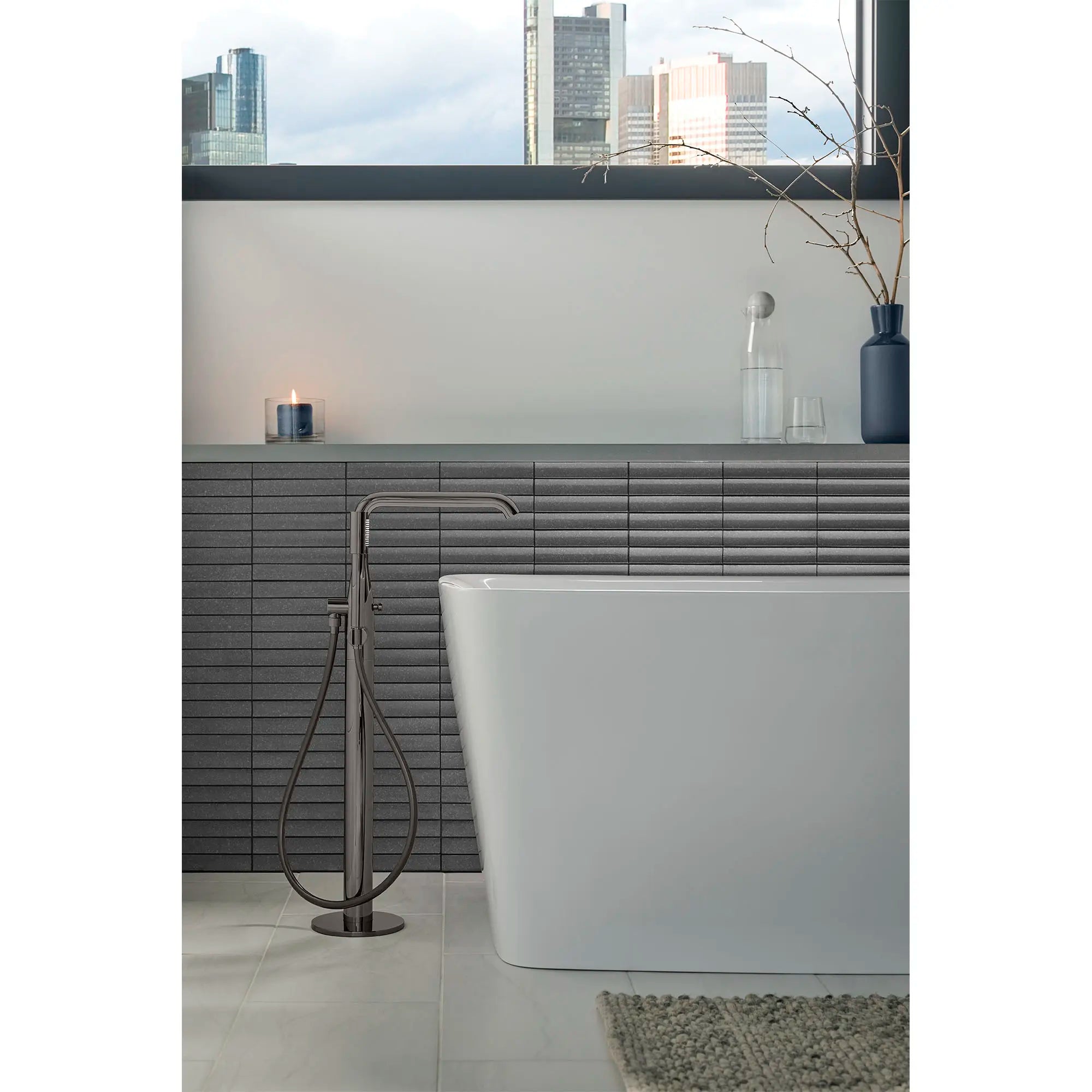 Single-Handle Freestanding Tub Faucet with 1.75 GPM (6.6 L/min) Hand Shower // HARD GRAPHITE // 161732_Essence_EnvironmentFull_23491A0A_0001_May2023_0_CDNwebp.webp