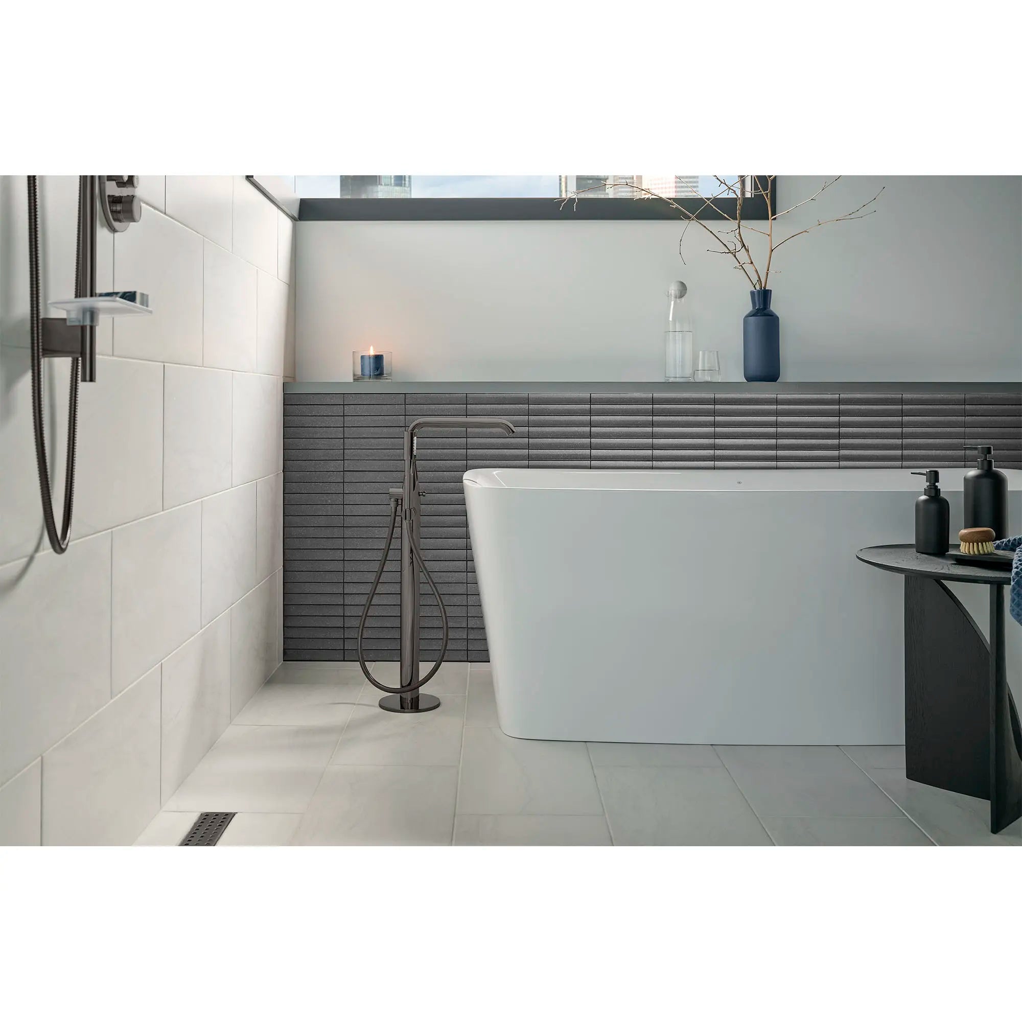 Single-Handle Freestanding Tub Faucet with 1.75 GPM (6.6 L/min) Hand Shower // HARD GRAPHITE // 164215_Essence_EnvironmentFull_23491A0A_0002_May2023_0_CDNwebp.webp