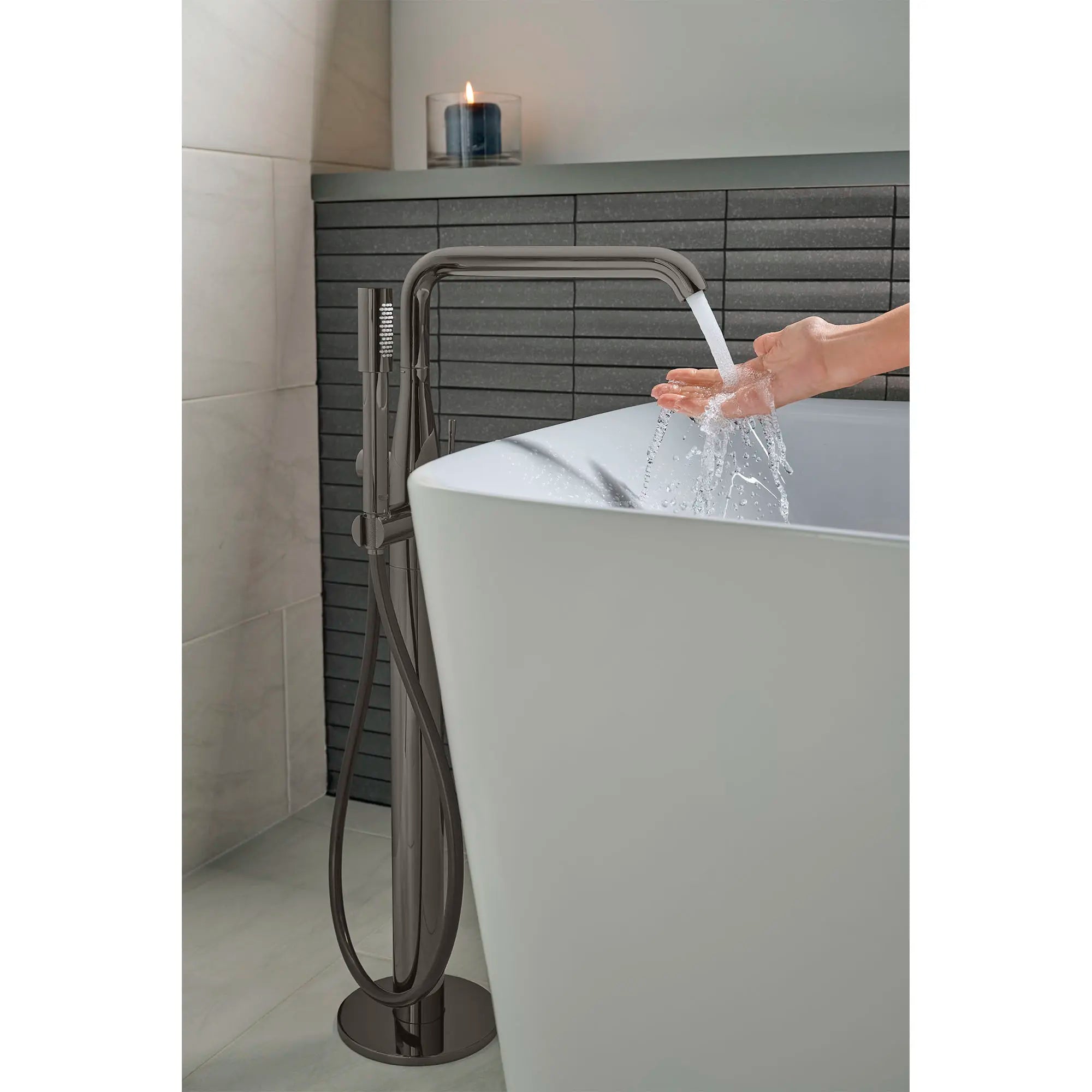 Single-Handle Freestanding Tub Faucet with 1.75 GPM (6.6 L/min) Hand Shower // HARD GRAPHITE // 164507_Essence_Lifestyle_23491A0A_0001_May2023_0_CDNwebp.webp