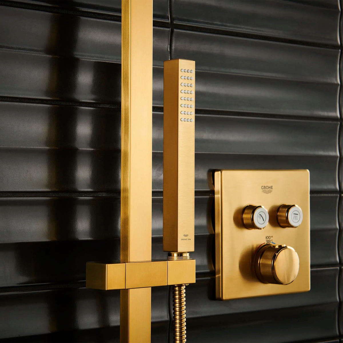 Euphoria Cube+ Stick Hand Shower - 1 Spray, 1.75 GPM (6.6 L/min) // BRUSHED COOL SUNRISE // 165883_Grohtherm_EnvironmentCloseUp_26867GN0_29141GN0_0001_Aug2023_0_CDNwebp_f5f83af6-6084-4c4a-9794-2db37e2651a6.webp