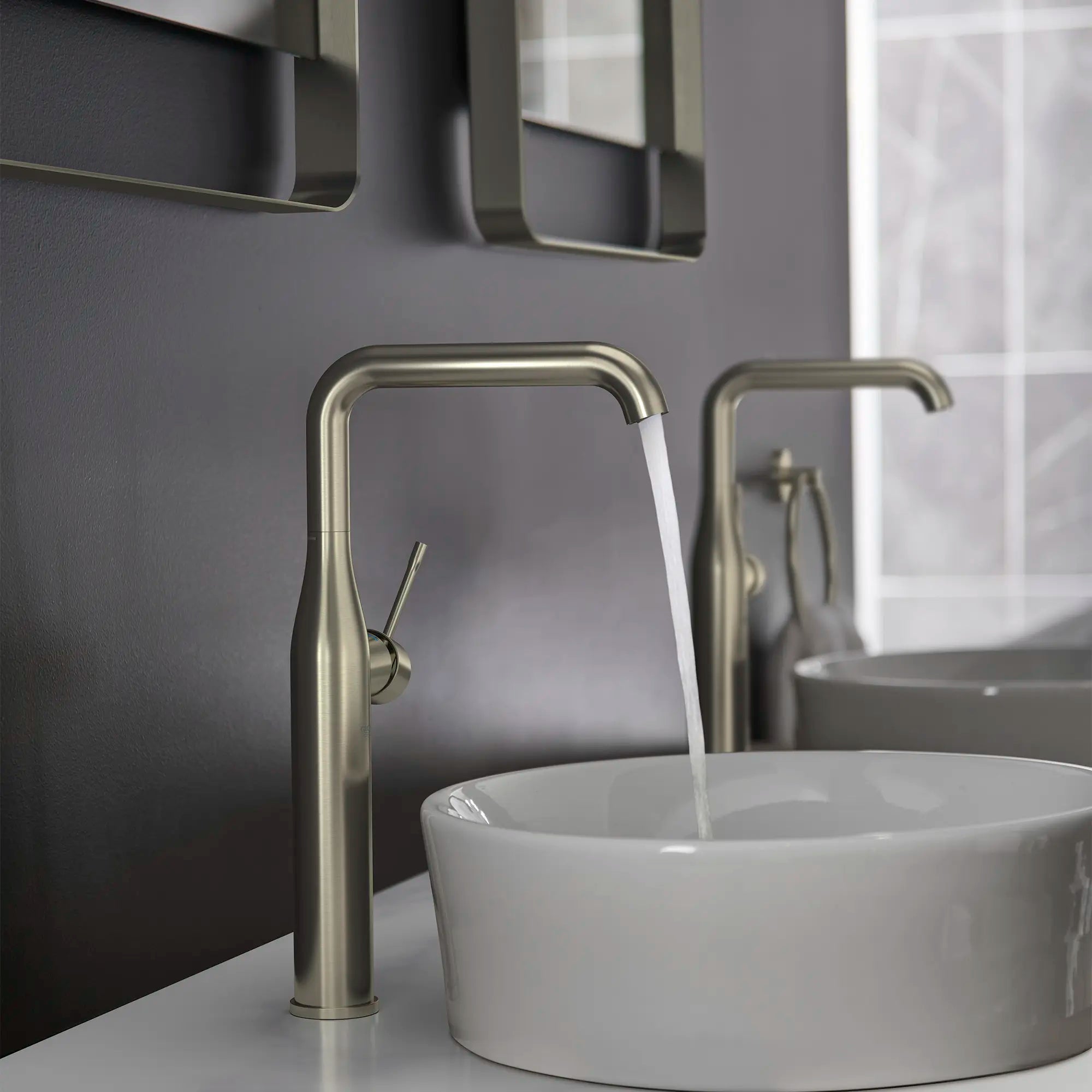 Single Hole Single-Handle Deck Mount Vessel Sink Faucet, 1.2 GPM (4.5 L/min) // BRUSHED NICKEL INFINITYFINISH // 236986_Essence_EnvironmentCloseup_23538ENA_0002_Dec2023_CDNwebp.webp