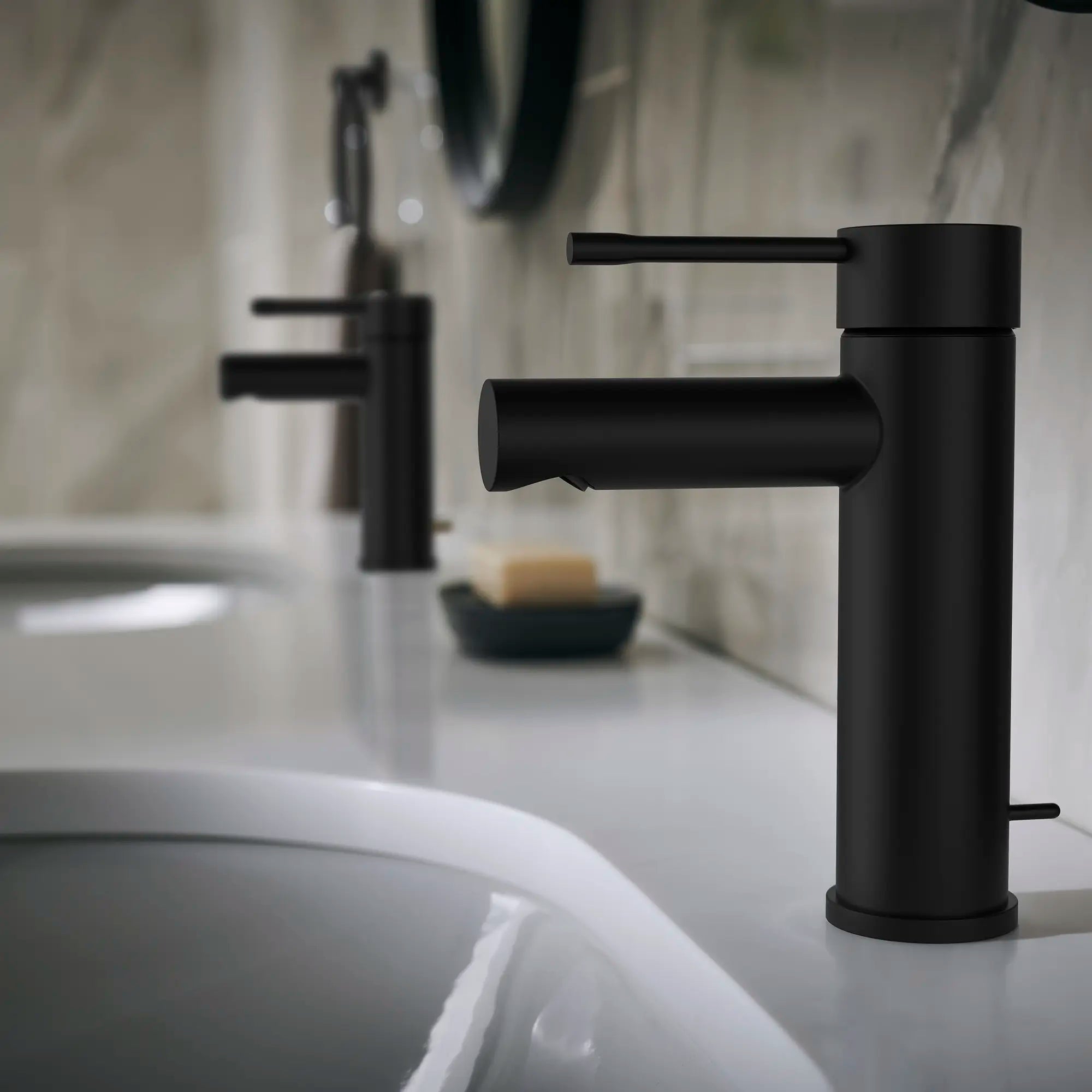 Single Hole Single-Handle S-Size Bathroom Faucet, 1.2 GPM (4.5 L/min) // MATTE BLACK // 236998_Essence_EnvironmentCloseup_322162431_0001_Dec2023_CDNwebp.webp