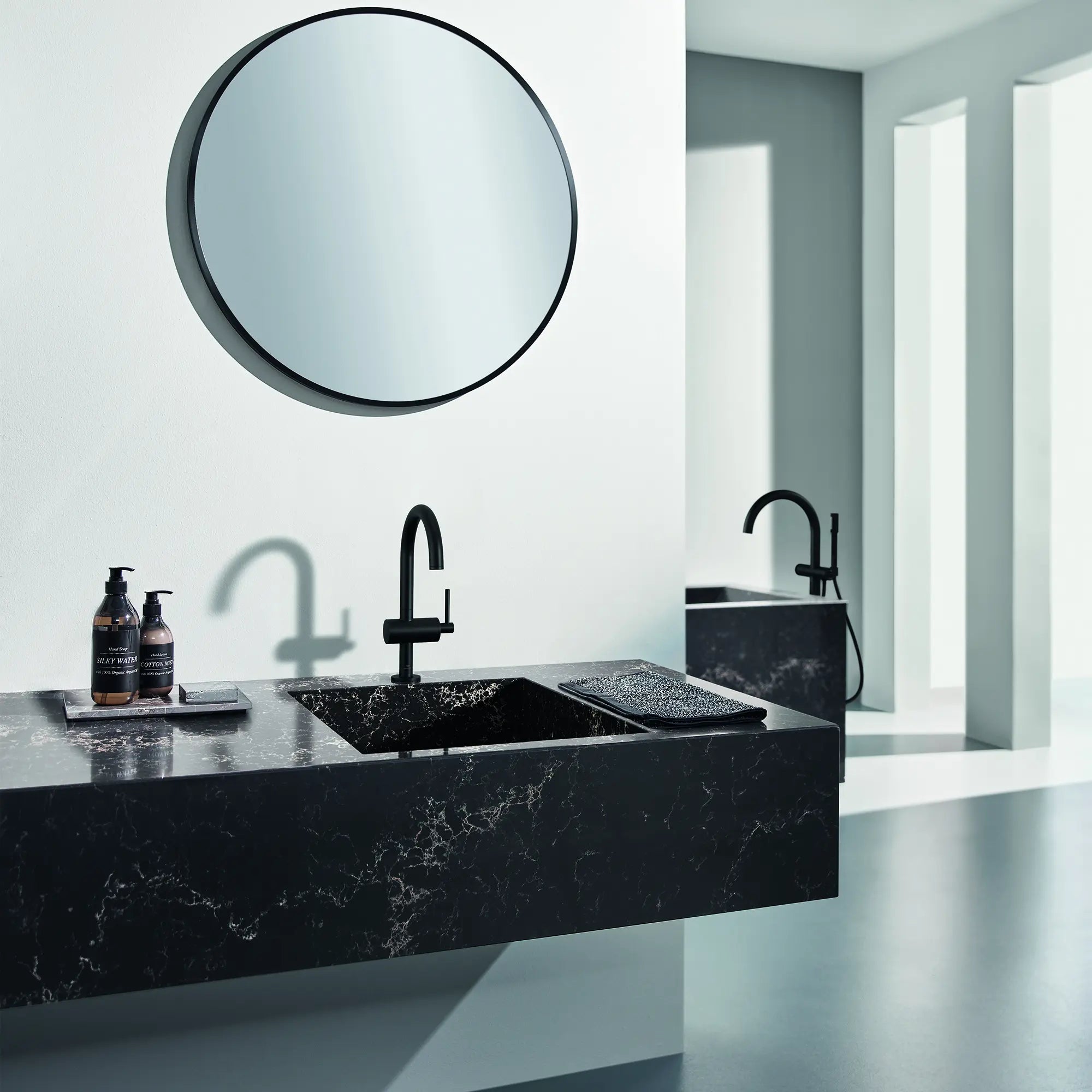 Atrio Single Hole Single-Handle L-Size Bathroom Faucet, 1.2 GPM (4.5 L/min) // MATTE BLACK // 244566_AtrioSPA_EnvironmentCloseUp_243502430_0003_APR2024_CDNwebp.webp