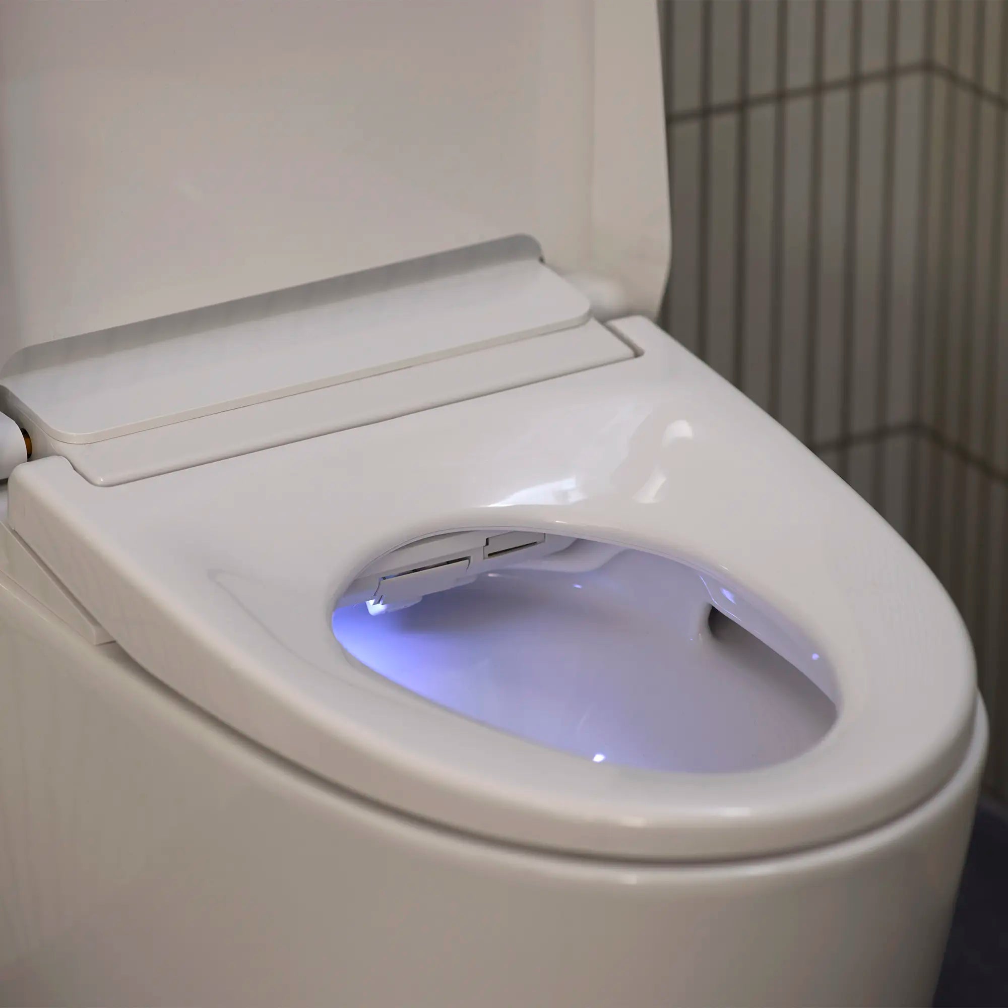 Electronic Bidet Toilet, 1.28/0.8 gpf (4.8/3.0 Lpf) // ALPINE WHITE // 278930_Sensia_EnvironmentCloseUp_131886SH00.020_0005_November2025_0_CDNwebp.webp