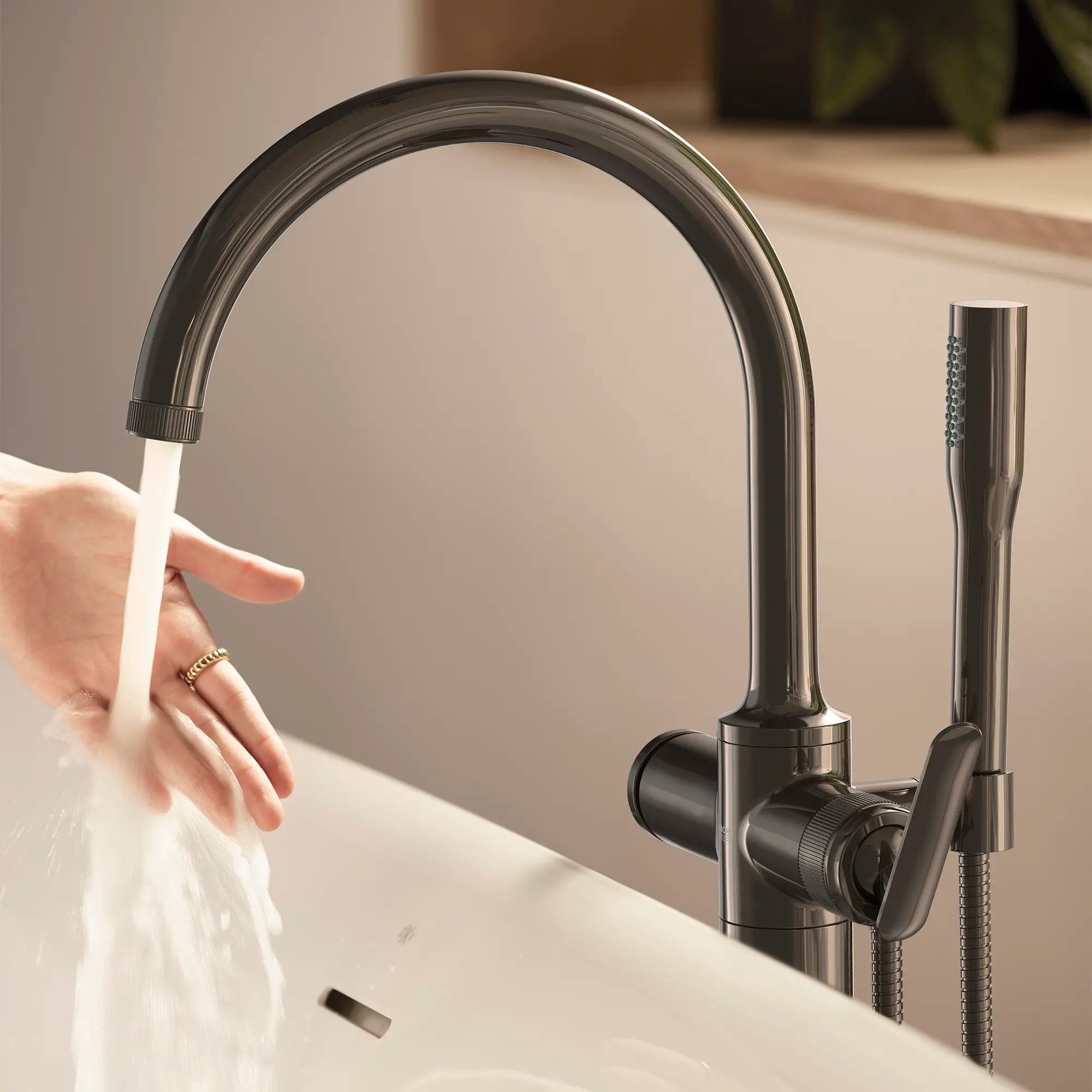 Listra Single-Handle Freestanding Tub Faucet with 1.75 gpm (6.6L/min) Hand Shower // HARD GRAPHITE // 282576_Listra_EnvironmentCloseUp_106256A000_0002_JANUARY2026_1_CDNwebp.webp
