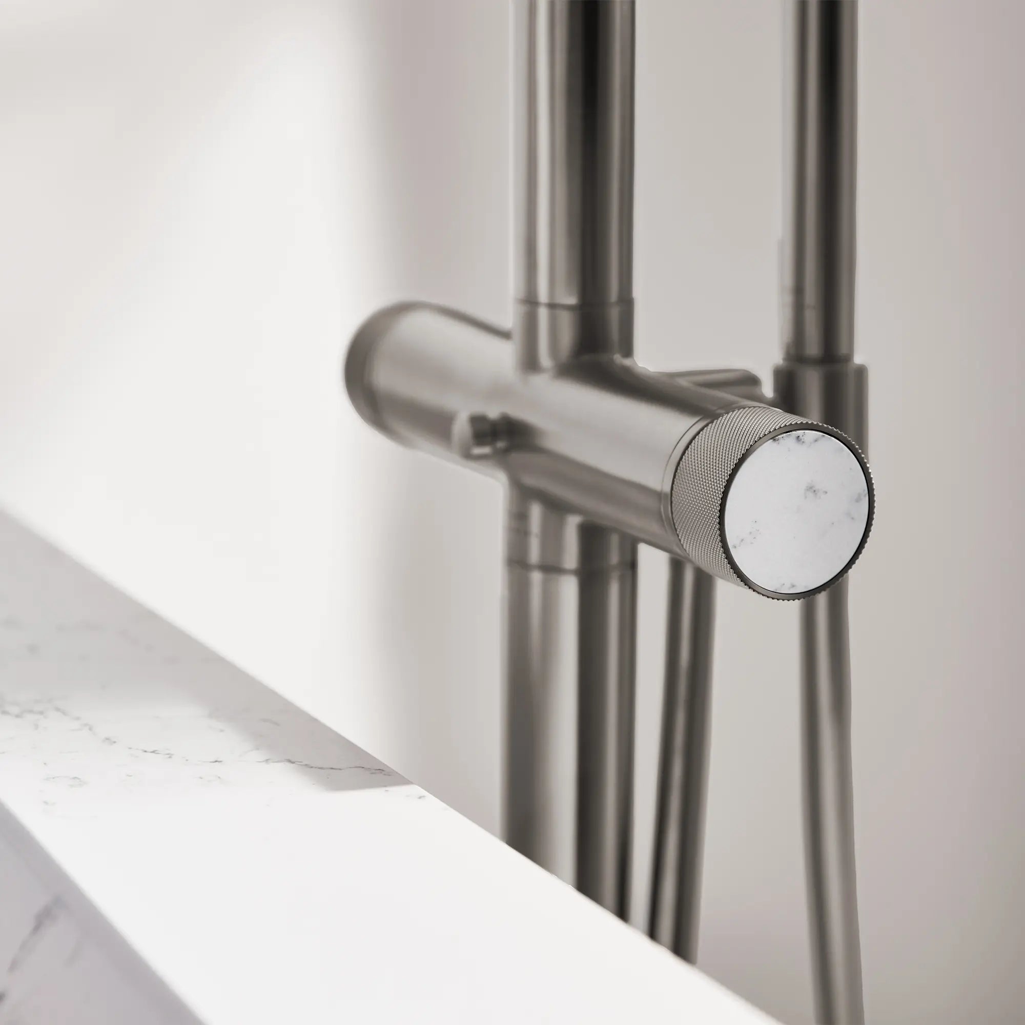 Atrio Private Collection 2-Handle Free Standing Tub Filler with Knob Handles, with 1.75 GPM Hand Shower // BRUSHED HARD GRAPHITE // 288568_Atrio_PC_EnvironmentCloseUp_105772AL00_0002_April2026_0_CDNwebp.webp