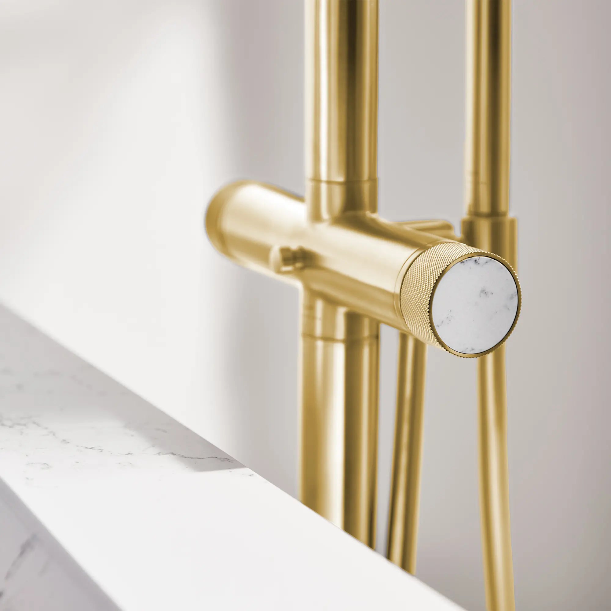 Atrio Private Collection 2-Handle Free Standing Tub Filler with Knob Handles, with 1.75 GPM Hand Shower // BRUSHED COOL SUNRISE // 288578_Atrio_PC_EnvironmentCloseUp_105772GN0_0002_April2026_0_CDNwebp.webp