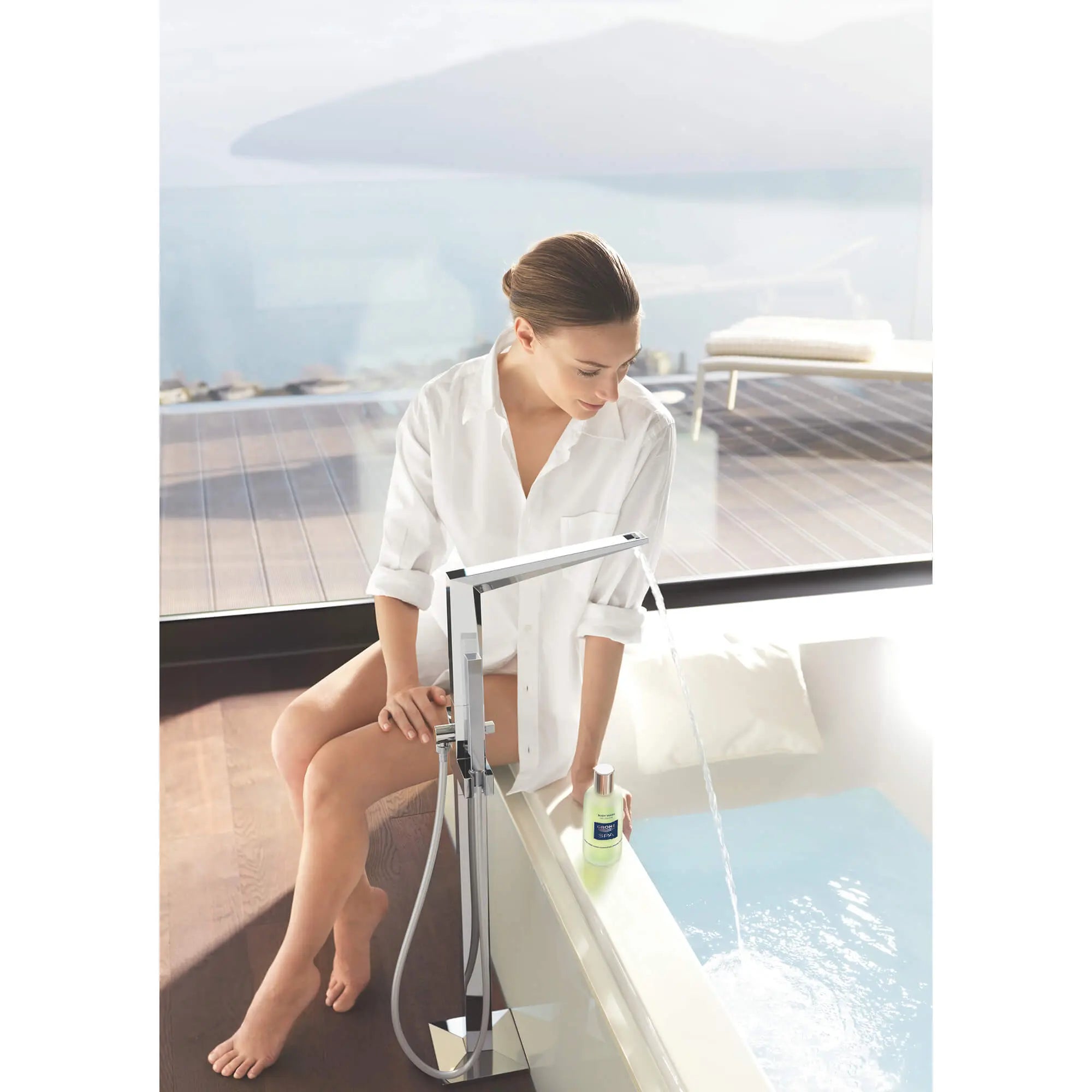 Single-Handle Freestanding Tub Faucet with 1.75 GPM Hand Shower // GROHE STARLIGHT CHROME // 789_23119000-floor-standing-tub-filler-enviro-9_0_CDNwebp.webp